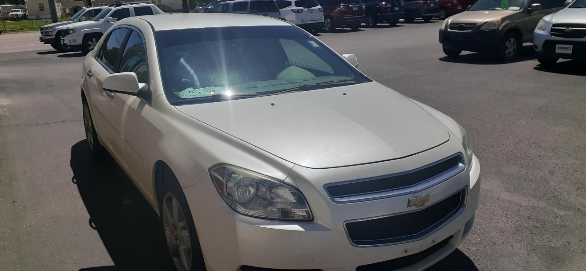 2012 Chevrolet Malibu 2LT (1G1ZD5EU8CF) with an 2.4L L4 DOHC 16V FFV engine, 6-Speed Automatic transmission, located at 2015 Cambell Street, Rapid City, SD, 57701, (605) 342-8326, 44.066433, -103.191772 - CARFAX AVAILABLE - Photo#4